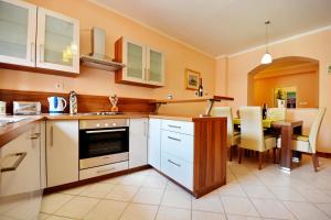 Kuchyň nebo kuchyňský kout v ubytování Apartment Martina