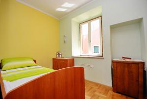 Postel nebo postele na pokoji v ubytování Apartment Martina