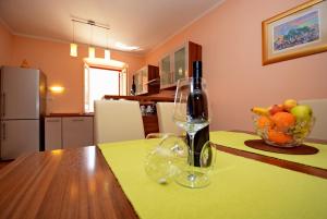 Kuchyň nebo kuchyňský kout v ubytování Apartment Martina