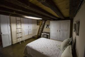 Una cama o camas en una habitación de Posada Niña Juana