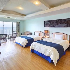 Cama o camas de una habitación en Resort Hotel Bel Paraiso