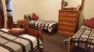 Una cama o camas en una habitación de Tara Spa Apartments