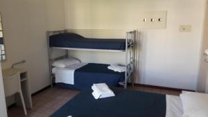 Postel nebo postele na pokoji v ubytování B&B - Meuble' - Hotel " CORDIALE "