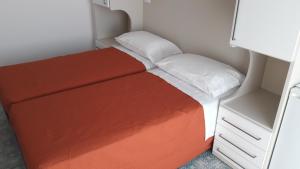 Postel nebo postele na pokoji v ubytování B&B - Meuble' - Hotel " CORDIALE "