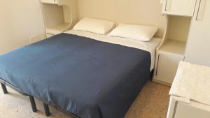 Postel nebo postele na pokoji v ubytování B&B - Meuble' - Hotel " CORDIALE "