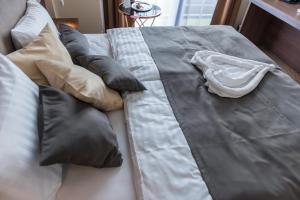 Postel nebo postele na pokoji v ubytování Hotel Thermalpark