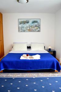 Postel nebo postele na pokoji v ubytování Rooms Lux