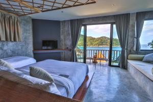 Postel nebo postele na pokoji v ubytování Sai Daeng Resort + 37 fotografií