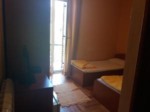 Кровать или кровати в номере Apartment Danka