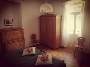 Posteľ alebo postele v izbe v ubytovaní Hotel Fiames