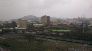 a view of a city with buildings in the background at Almeswari Suites in Al Baha