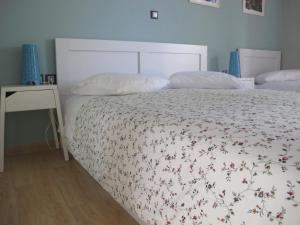 A bed or beds in a room at Athenian apartment with garden, near metro station Chalandri Nu 3