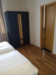 Ein Bett oder Betten in einem Zimmer der Unterkunft Hotel Domhof