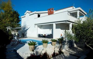 Amazing home in Okrug Gornji with Outdoor swimming pool and 4 Bedrooms