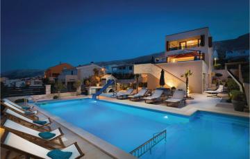 Amazing home in Pag with 7 Bedrooms, WiFi and Outdoor swimming pool