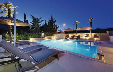 Amazing home in Novalja with 2 Bedrooms, WiFi and Outdoor swimming pool