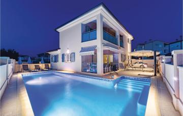Four-Bedroom Holiday Home in Peroj