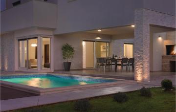 Nice home in Krsan with 4 Bedrooms, Sauna and Outdoor swimming pool