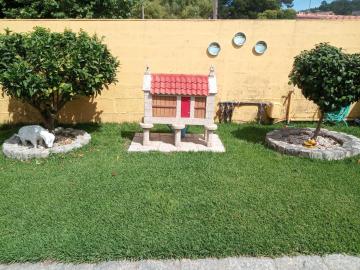 Casa con jardín en primera línea de playa