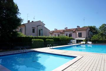 Cosy two - storey villa with a garden and a shared swimming pool