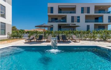 Awesome apartment in Sveti Filip i Jakov with Outdoor swimming pool, WiFi and 2 Bedrooms