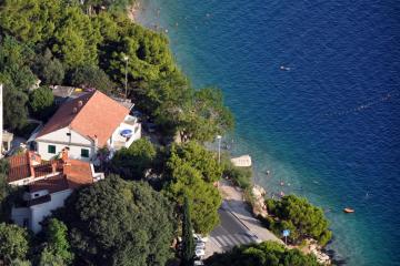Apartments by the sea Omis - 6003