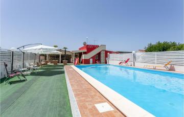 Awesome home in S, Maria del Focallo with 2 Bedrooms, WiFi and Outdoor swimming pool