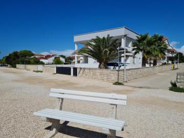 Via apartment first row by the sea
