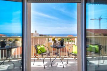 Alghero Vista Mare piano centro per 6 persone posto auto