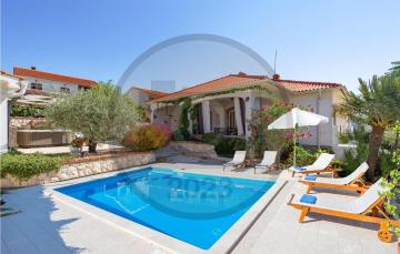 Nice home in Barbat with 4 Bedrooms, Jacuzzi and Heated swimming pool
