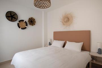 Modern apartment directly on the beach with WiFi and air conditioning