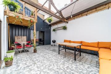Loft industriel avec patio en centre-ville