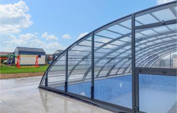Stunning home in Jezierzany with Outdoor swimming pool, Sauna and 1 Bedrooms