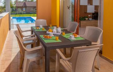 Beautiful home in Marcana with 2 Bedrooms, WiFi and Outdoor swimming pool