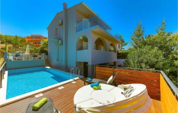 Amazing home in Trogir with WiFi, Heated swimming pool and 4 Bedrooms