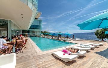 Beautiful apartment in Novi Vinodolski with Outdoor swimming pool, Sauna and 2 Bedrooms