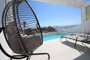 Modern house, private heated pool and sea views