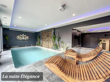 Chambre avec spa, piscine et sauna privatif
