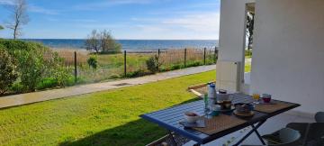 Charming, very cosy ground floor apartment with direct access to the beautiful beach of Bravone , in Linguizitta Corsica