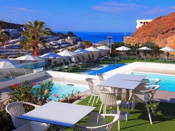 Vacation resort apartment with partial ocean views and pool in Puerto Rico