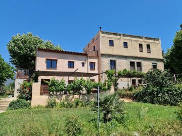 Apartamento familiar en una masía compartida