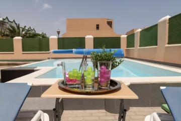 Lightbooking Esmeralda piscina privada Caleta de Fuste