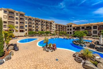 Relax in the sun at apartment with ocean view and pool