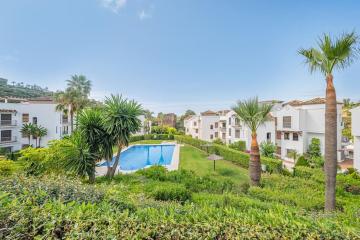 Apartamento en campo de golf con piscinas