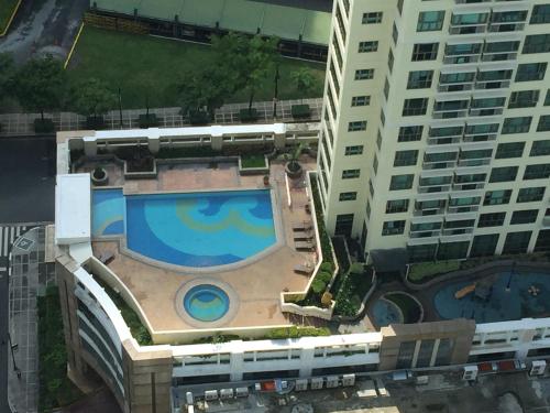 A view of the pool at Modern Asian Condo at Forbeswood Parklane The Fort BGC or nearby