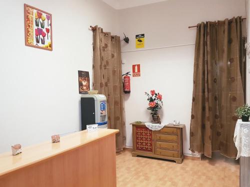 TV a/nebo společenská místnost v ubytování Pensión Berti Madrid