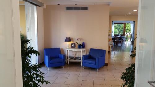 Posezení v ubytování Hotel Leone