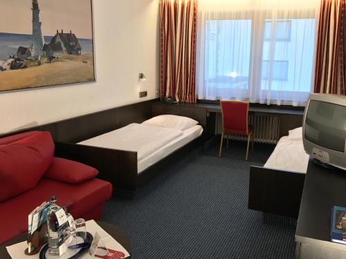 Televisyen dan/atau pusat hiburan di Hotel Rheinlust