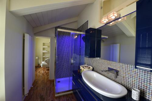 Een badkamer bij La Maison du Soleil