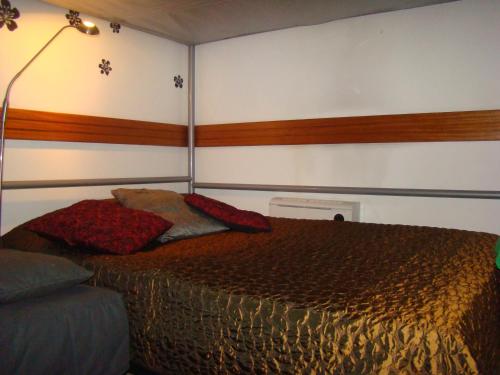 Ένα ή περισσότερα κρεβάτια σε δωμάτιο στο Tejo Apartment